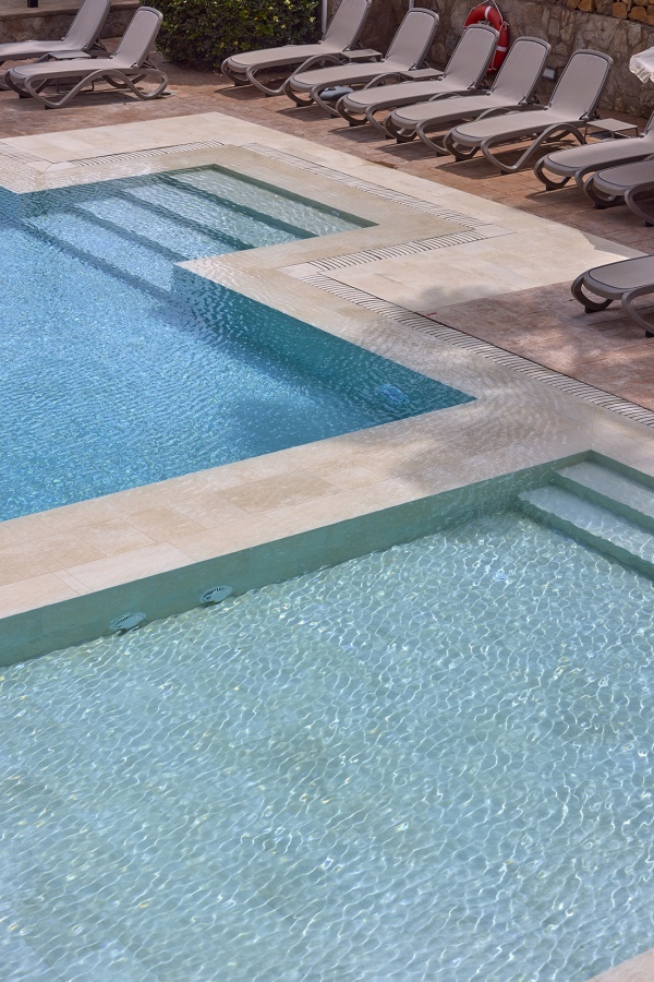 Swimming pool of the Hotel Canyamel Classic in Mallorca, a perfect place to enjoy a vacation in the Balearic Islands.